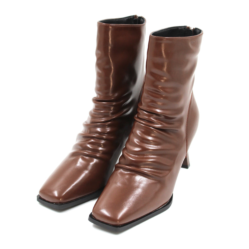 Modern rippled leather heel boots