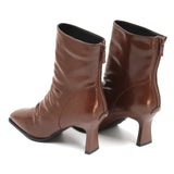 Modern rippled leather heel boots