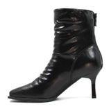 Modern rippled leather heel boots