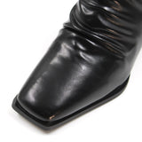 Modern rippled leather heel boots