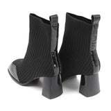 Ribbed knit patent toe detail boots