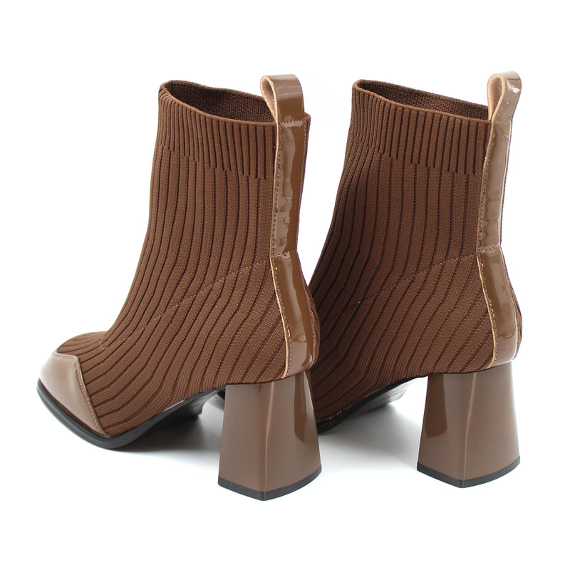 Ribbed knit patent toe detail boots